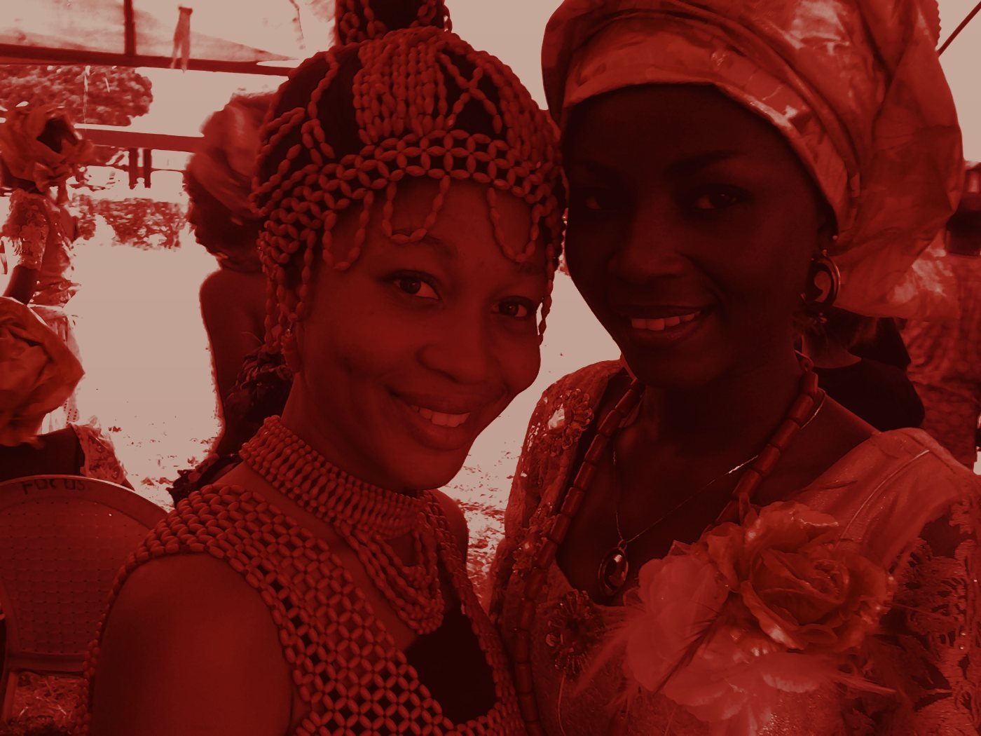Edo women celebrating in traditional attire with coral beads