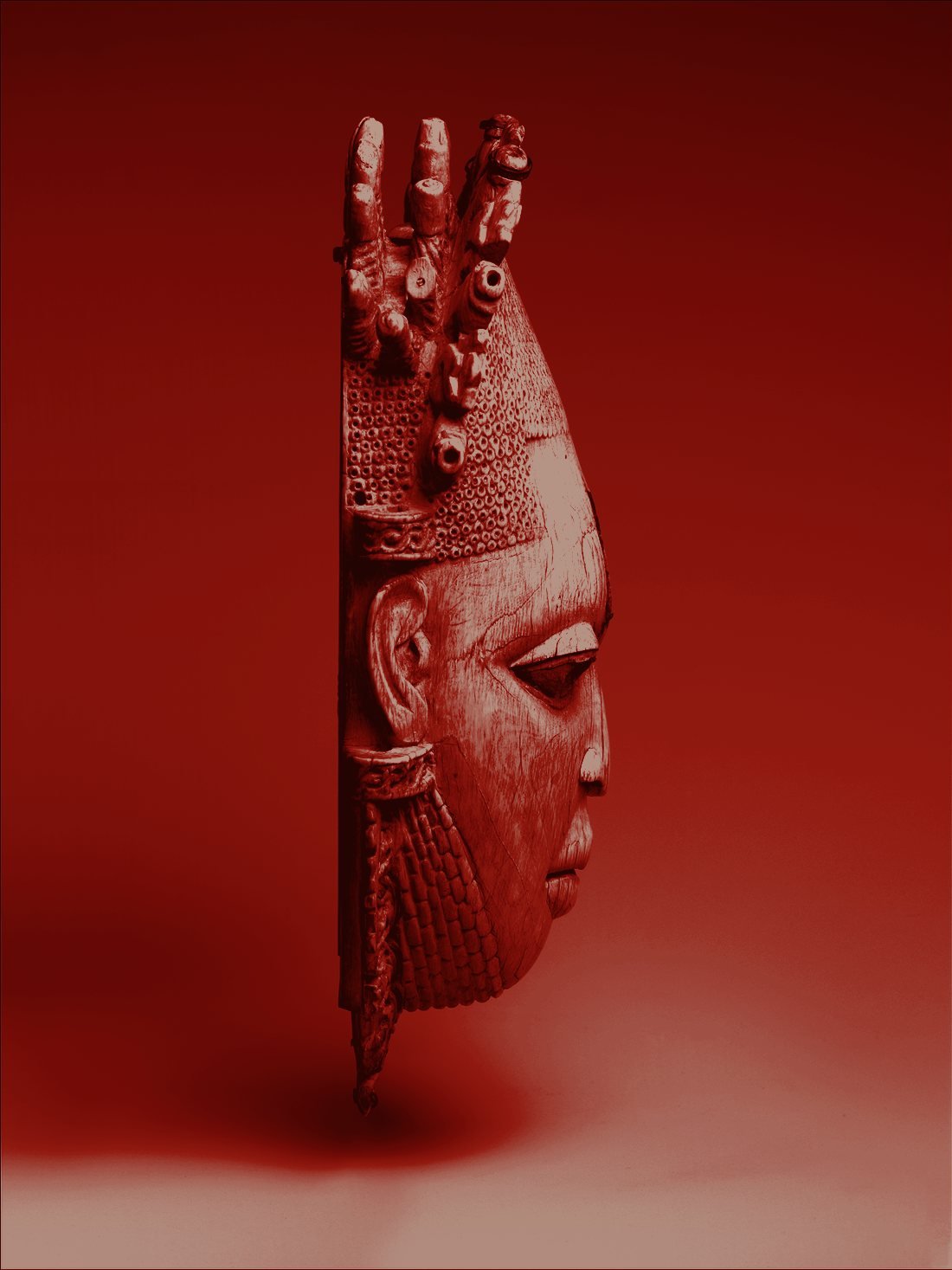 Ivory pendant mask of Queen Mother Idia in profile